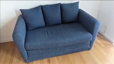 Abbildung: Couch ausziehbar in blau